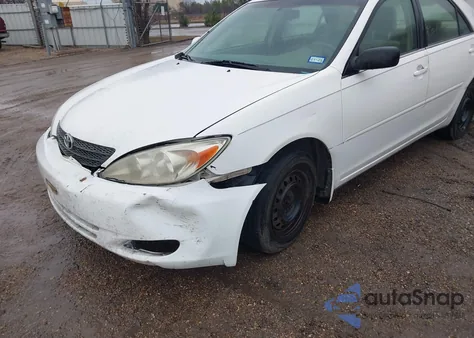 2002 Toyota Camry Le from USA, damaged, VIN JTDBE32K920110820